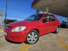 CHEVROLET - PRISMA - 2010/2010 - Vermelha - R$ 23.900,00