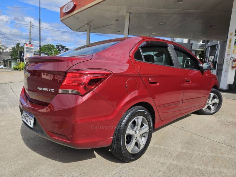 CHEVROLET - PRISMA - 2017/2017 - Vermelha - R$ 59.900,00