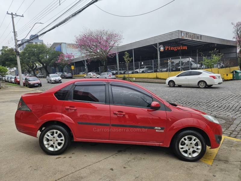 FORD - FIESTA - 2011/2011 - Vermelha - R$ 30.900,00